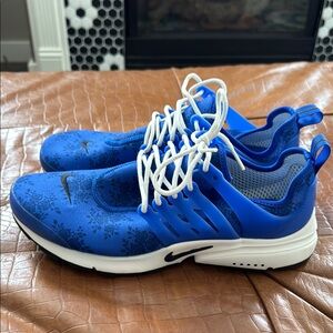 Nike Blue and White Athletic Shoes with Sporty Design